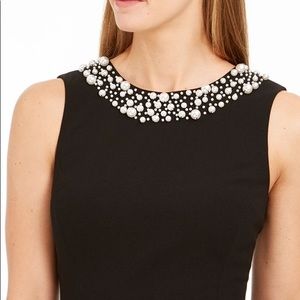 Calvin Klein, Black dress with pearl collar